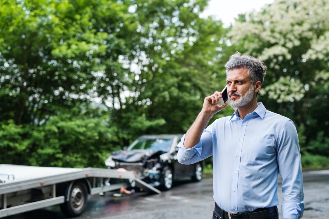 Stranded driver calling for roadside help